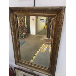 A gilt wood framed mirror, 66cm x 49cm including frame. Please note, lots 1-1000 are not available