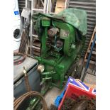 A large air compressor on wheels Please note, lots 1-1000 are not available for live bidding on