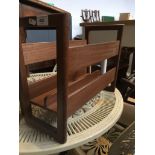 A mid 20th century teak magazine rack Please note, lots 1-1000 are not available for live bidding on