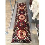 An Eastern style geometric runner, approx 71cm x 290cm. Please note, lots 1-1000 are not available