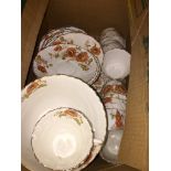 A box of cups and saucers. Please note, lots 1-1000 are not available for live bidding on the-