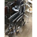 A folding wheelchair Please note, lots 1-1000 are not available for live bidding on the-saleroom.