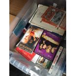 A box of books, DVDs, magazines, etc Please note, lots 1-1000 are not available for live bidding