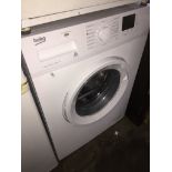 A Beko washing machine Please note, lots 1-1000 are not available for live bidding on the-saleroom.