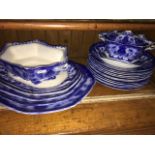 An Oxford Burslem Edwardian blue and white dinner service comprising tureens, platters and plates.