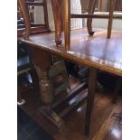 Oak drop leaf table and four chairs together with another oak drawer leaf table Please note, lots