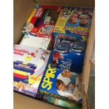 A large box of misc toys and board games. Please note, lots 1-1000 are not available for live