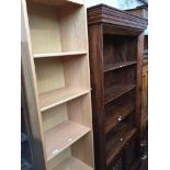 A tall narrow bookcase Please note, lots 1-1000 are not available for live bidding on the-saleroom.