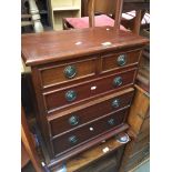 A reproduction mahogany chest of drawer of small proportions Please note, lots 1-1000 are not