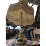 An onyx and metal table lamp. Please note, lots 1-1000 are not available for live bidding on the-