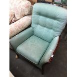 A Parker Knoll wood show and green upholstered armchair Please note, lots 1-1000 are not available