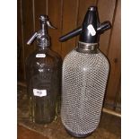 Two vintage soda syphons Please note, lots 1-1000 are not available for live bidding on the-