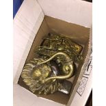 A box of brass and other metals to include brass Lion's face door knocker, etc. Please note, lots