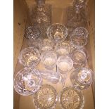 A box of crystal drinking glasses including 2 decanters. Please note, lots 1-1000 are not
