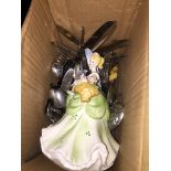 A box of EPNS and other cutlery and a pottery figure. Please note, lots 1-1000 are not available for