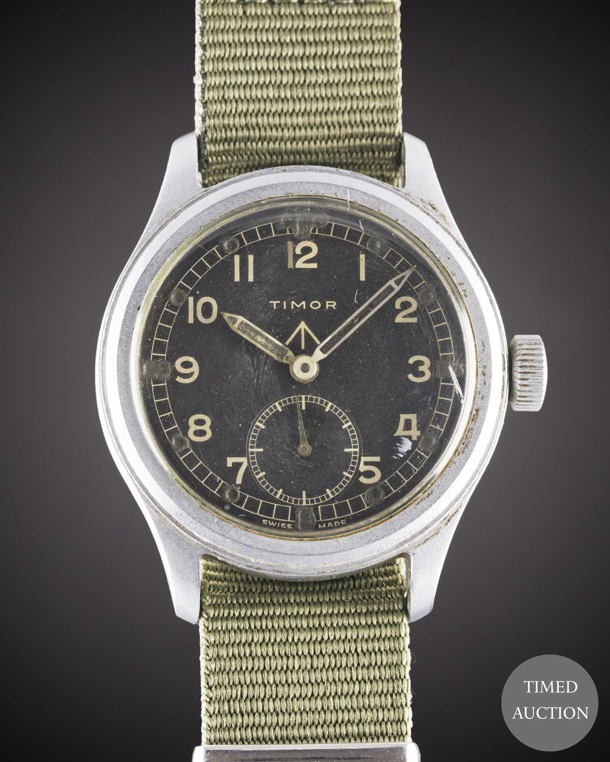 A GENTLEMAN'S STAINLESS STEEL BRITISH MILITARY TIMOR W.W.W. WRIST WATCH CIRCA 1940s, PART OF THE "