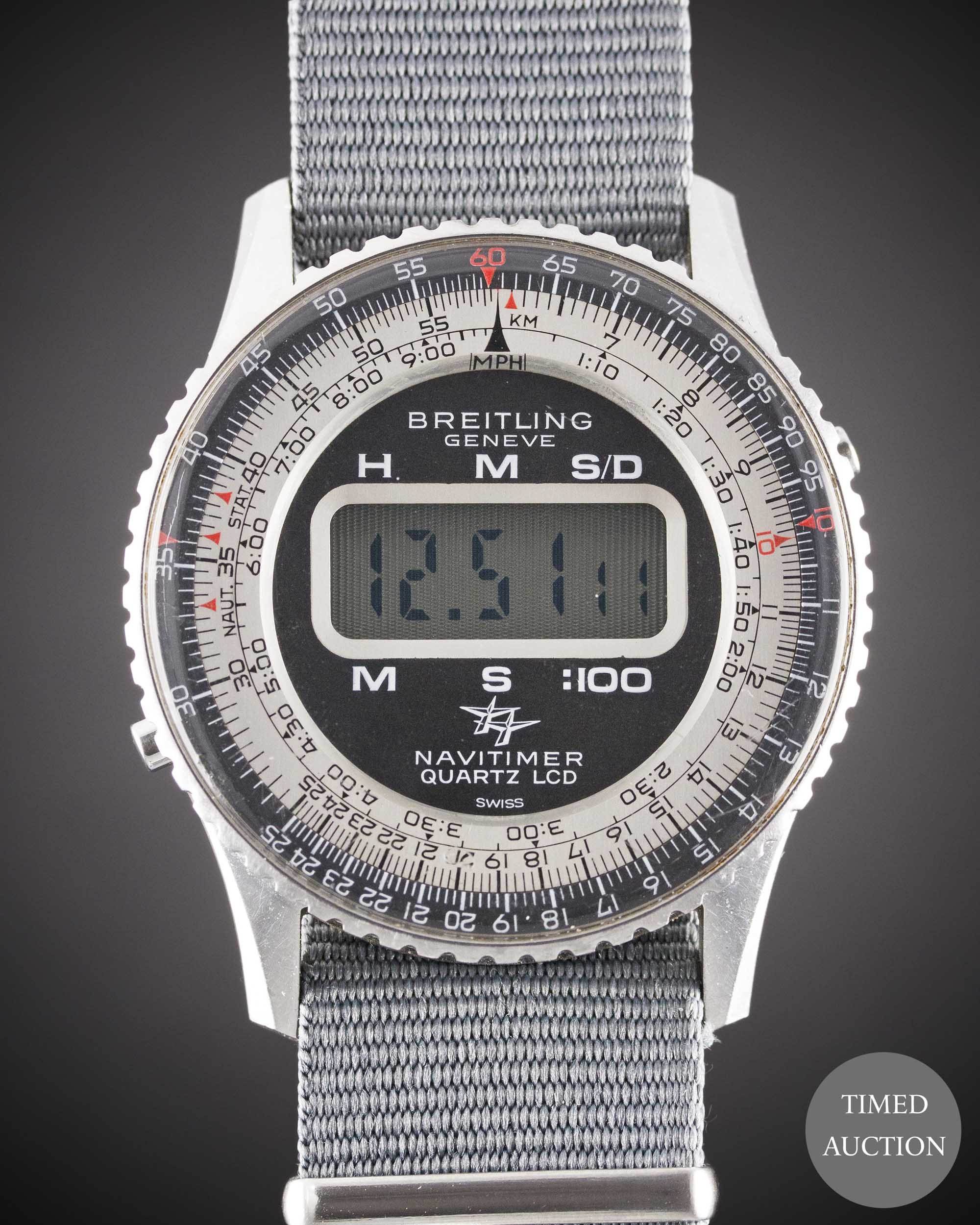 A GENTLEMAN'S STAINLESS STEEL BREITLING NAVITIMER QUARTZ LCD WRIST WATCH CIRCA 1977, REF. 9406