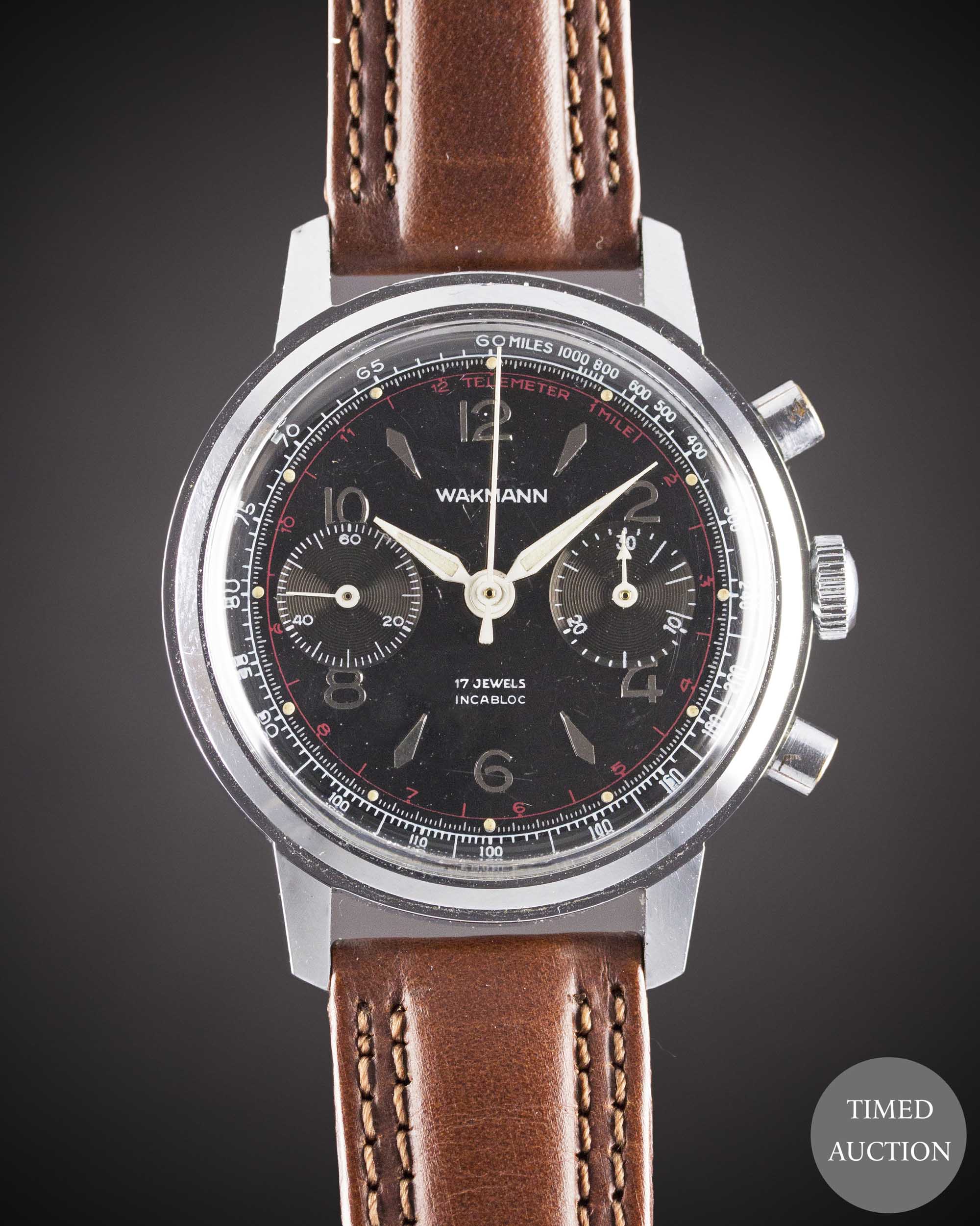 A GENTLEMAN'S WAKMANN CHRONOGRAPH WRIST WATCH CIRCA 1960s, WITH GLOSS BLACK DIAL Movement: 17J,