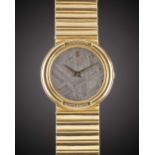 A GENTLEMAN'S SIZE 18K SOLID YELLOW GOLD CORUM METEORITE BRACELET WATCH CIRCA 1990s, REF. 50451-