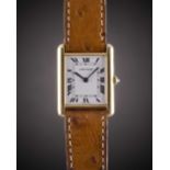 A GENTLEMAN'S SIZE 18K SOLID GOLD CARTIER TANK WRIST WATCH CIRCA 1990s Movement: Quartz, signed