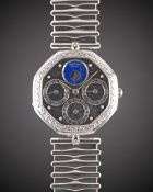 AN 18K SOLID WHITE GOLD & DIAMOND GERALD GENTA TRIPLE CALENDAR MOONPHASE BRACELET WATCH CIRCA