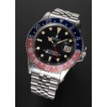 A GENTLEMAN'S STAINLESS STEEL ROLEX OYSTER PERPETUAL GMT MASTER "PEPSI" BRACELET WATCH CIRCA 1973,