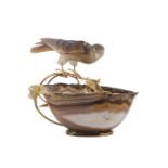 A FINE & RARE SILVER GILT & DIAMOND SET OBJET D'ART MODEL OF A PERCHED FALCON DRINKING FROM A BOWL