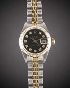 A LADIES STEEL & GOLD ROLEX OYSTER PERPETUAL DATEJUST BRACELET WATCH DATED 2003, REF. 79173 WITH