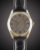 A GENTLEMAN'S 18K SOLID GOLD IWC AUTOMATIC WRIST WATCH CIRCA 1969, REF. 810A WITH BRUSHED GREY