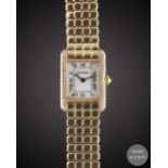 A LADIES 18K SOLID GOLD CARTIER TANK BRACELET WATCH CIRCA 1990s Movement: Quartz, signed Cartier.