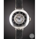 A GENTLEMAN'S SOLID SILVER ROLEX HALF HUNTER OFFICERS WRIST WATCH CIRCA 1920, WITH ENAMEL DIAL