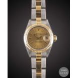 A LADIES STEEL & GOLD ROLEX OYSTER PERPETUAL DATEJUST BRACELET WATCH DATED 1998, REF. 69173 WITH