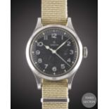 A GENTLEMAN'S STAINLESS STEEL BRITISH MILITARY OMEGA RAF PILOTS WRIST WATCH DATED 1956, WITH BLACK