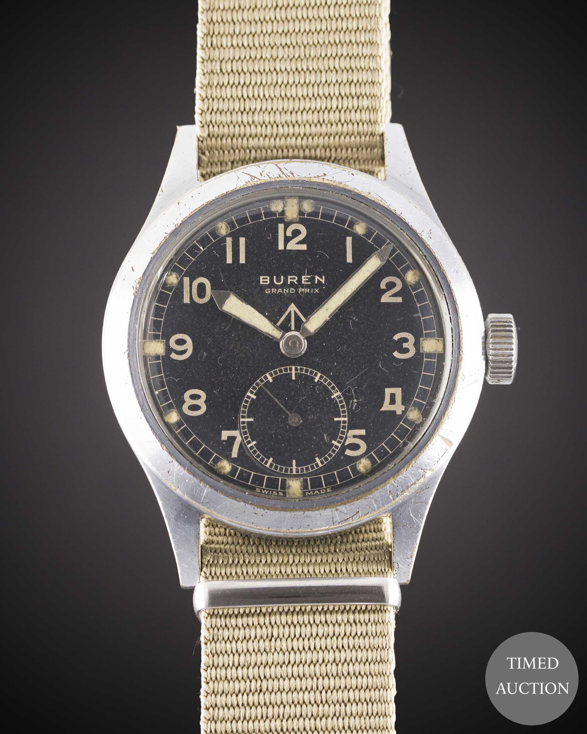 A GENTLEMAN'S BRITISH MILITARY BUREN GRAND PRIX W.W.W. WRIST WATCH CIRCA 1945, PART OF THE "DIRTY