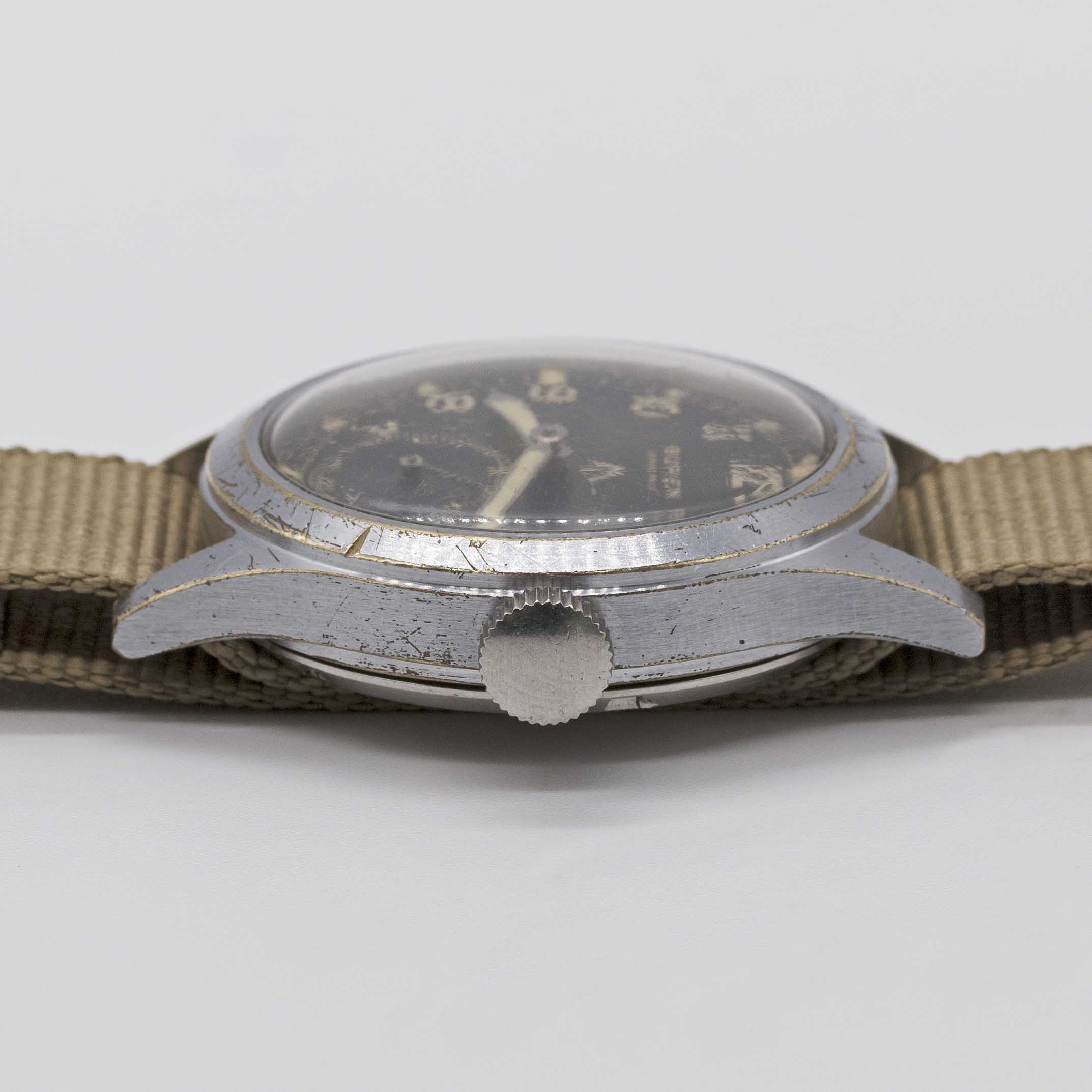 A GENTLEMAN'S BRITISH MILITARY BUREN GRAND PRIX W.W.W. WRIST WATCH CIRCA 1945, PART OF THE "DIRTY - Image 7 of 8