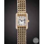 A LADIES 18K SOLID GOLD CARTIER TANK BRACELET WATCH CIRCA 1990s Movement: Quartz, signed Cartier.