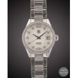 A LADIES STAINLESS STEEL & DIAMOND TAG HEUER CARRERA CALIBRE 9 AUTOMATIC BRACELET WATCH CIRCA