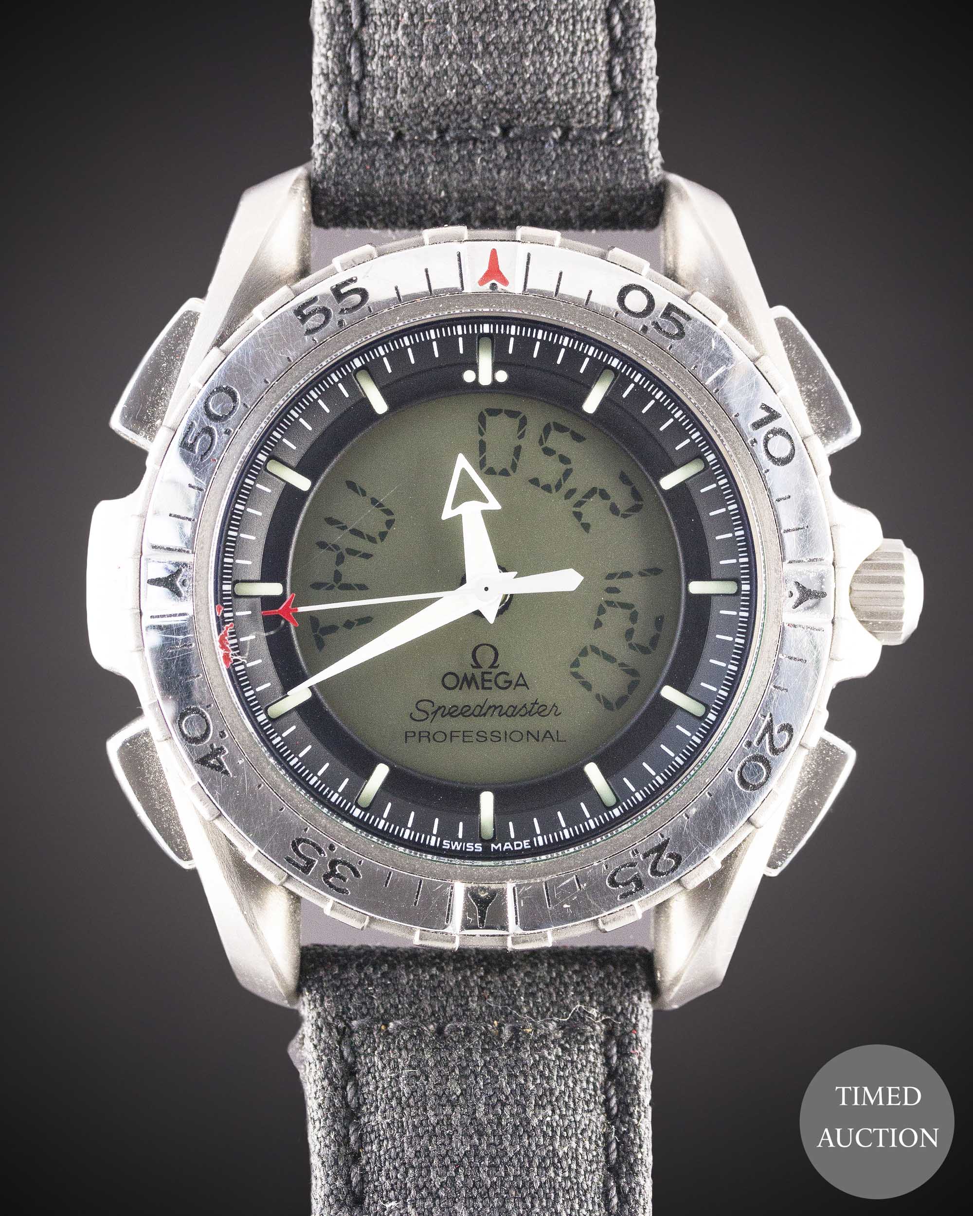 A GENTLEMAN'S TITANIUM OMEGA SPEEDMASTER PROFESSIONAL X-33 WRIST WATCH CIRCA 1998, REF. 3290.50.00