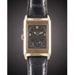 A GENTLEMAN'S 18K SOLID ROSE GOLD JAEGER LECOULTRE REVERSO DUOFACE NIGHT & DAY WRIST WATCH CIRCA