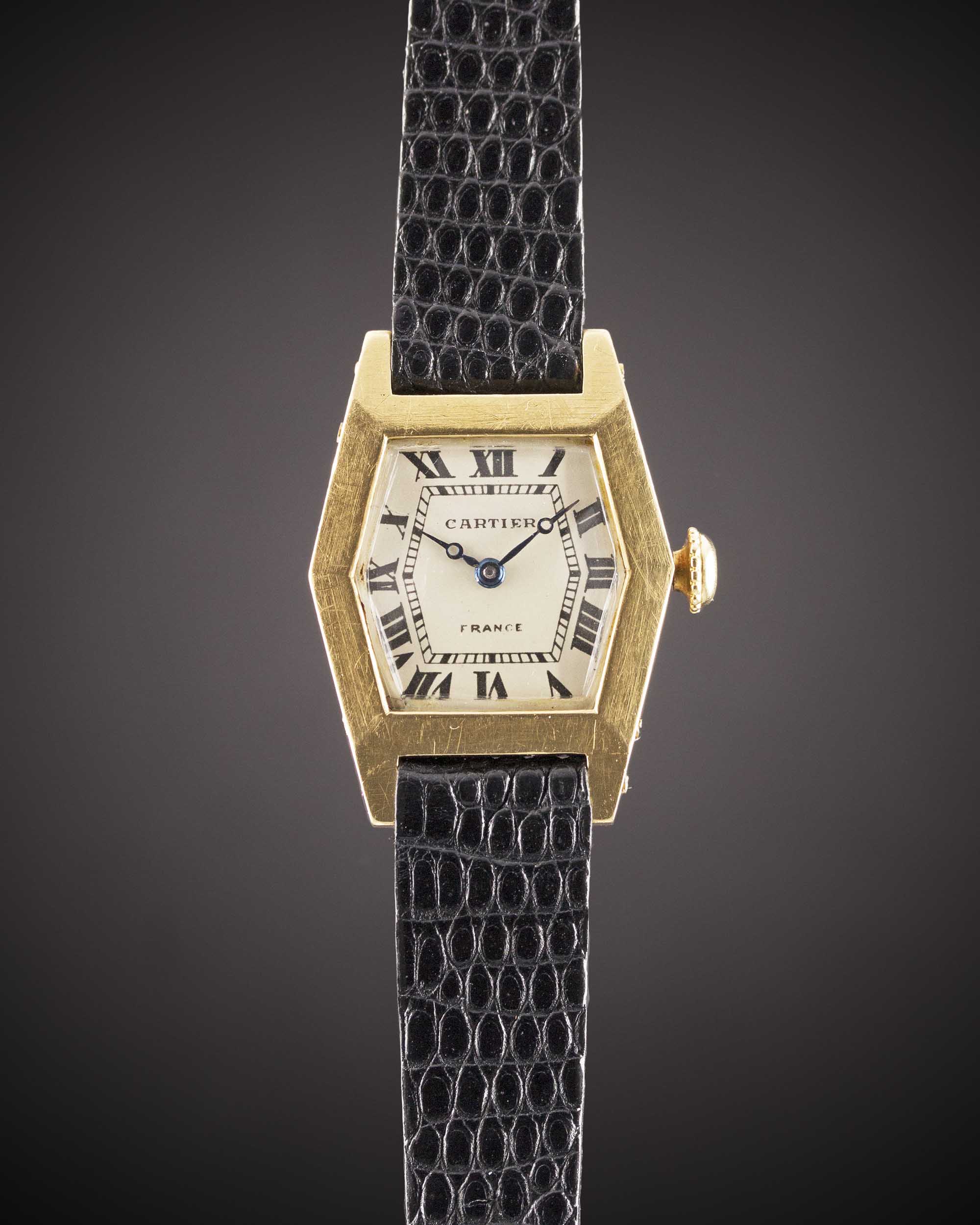A RARE LADIES 18K SOLID GOLD CARTIER FRANCE WRIST WATCH CIRCA 1940