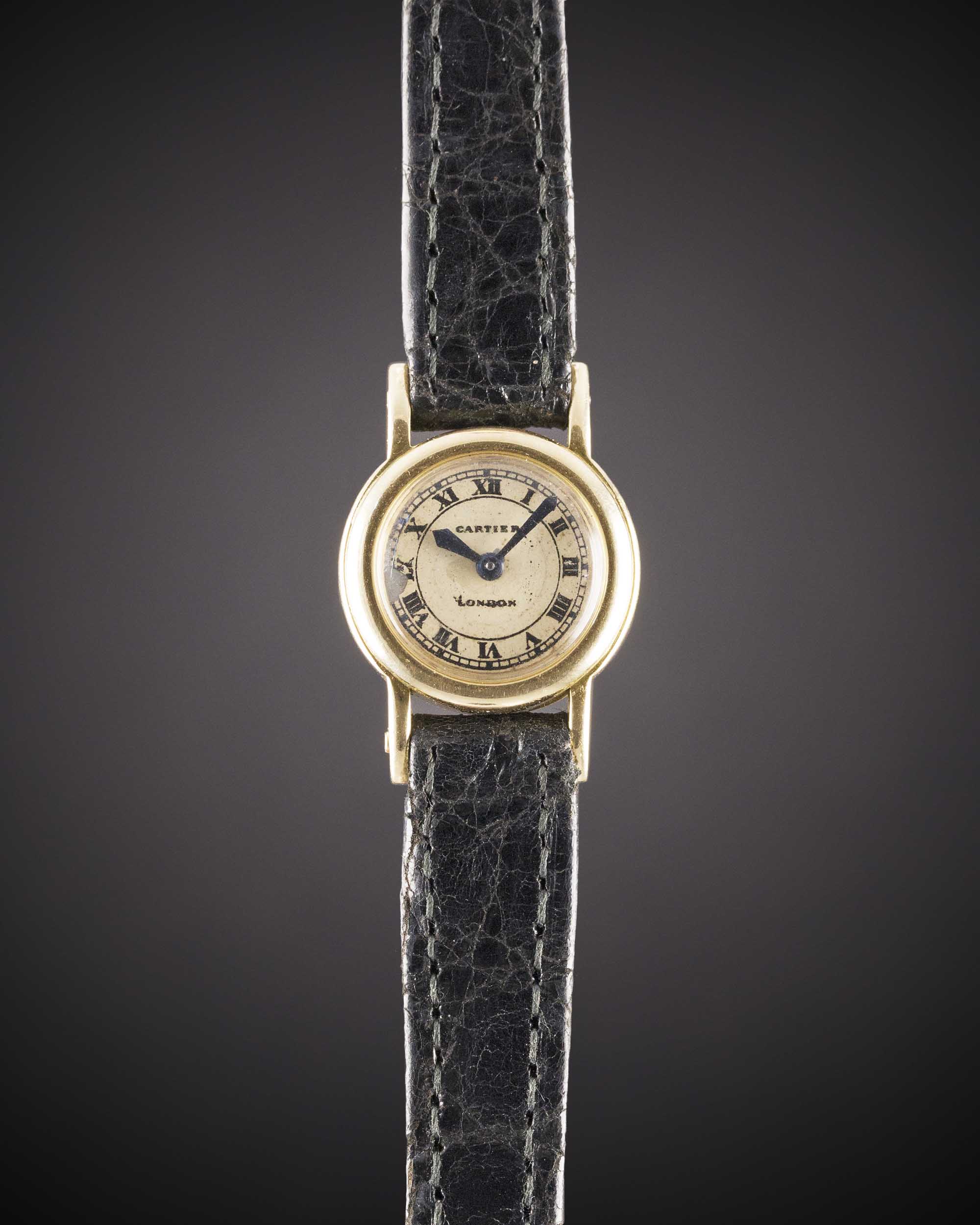 A RARE LADIES 18K SOLID GOLD CARTIER LONDON BACKWIND WRIST WATCH CIRCA 1961, WITH LONDON HALLMARKS