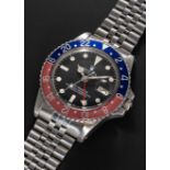 A GENTLEMAN'S STAINLESS STEEL ROLEX OYSTER PERPETUAL GMT MASTER "PEPSI" BRACELET WATCH CIRCA 1979,