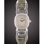 A FINE LADIES 18K SOLID WHITE GOLD & DIAMOND PATEK PHILIPPE GOLDEN ELLIPSE WRIST WATCH CIRCA