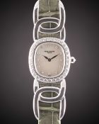 A FINE LADIES 18K SOLID WHITE GOLD & DIAMOND PATEK PHILIPPE GOLDEN ELLIPSE WRIST WATCH CIRCA