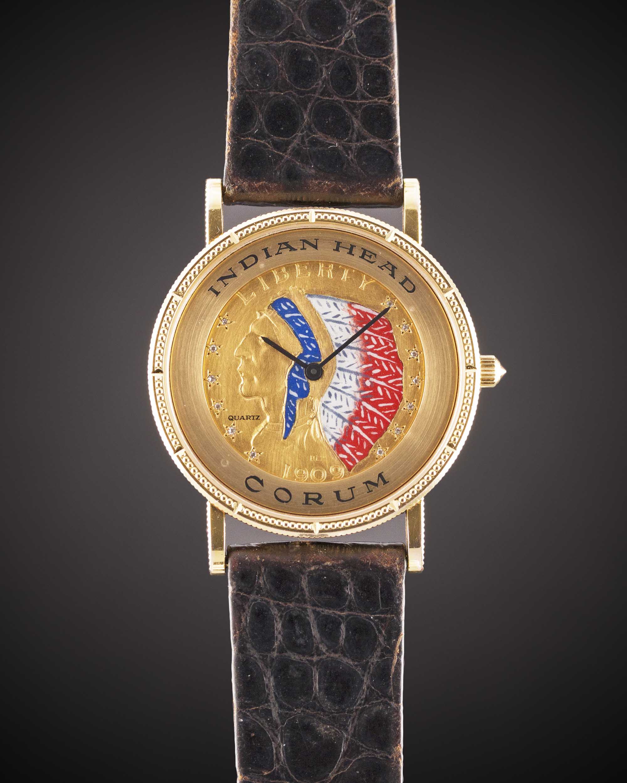 AN 18K SOLID YELLOW GOLD CORUM INDIAN HEAD FIVE DOLLAR COIN WRIST WATCH CIRCA 1990 Movement: Quartz.