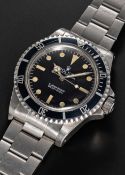 A GENTLEMAN'S STAINLESS STEEL ROLEX OYSTER PERPETUAL SUBMARINER BRACELET WATCH CIRCA 1983, REF. 5513