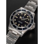 A GENTLEMAN'S STAINLESS STEEL ROLEX OYSTER PERPETUAL SUBMARINER BRACELET WATCH CIRCA 1983, REF. 5513