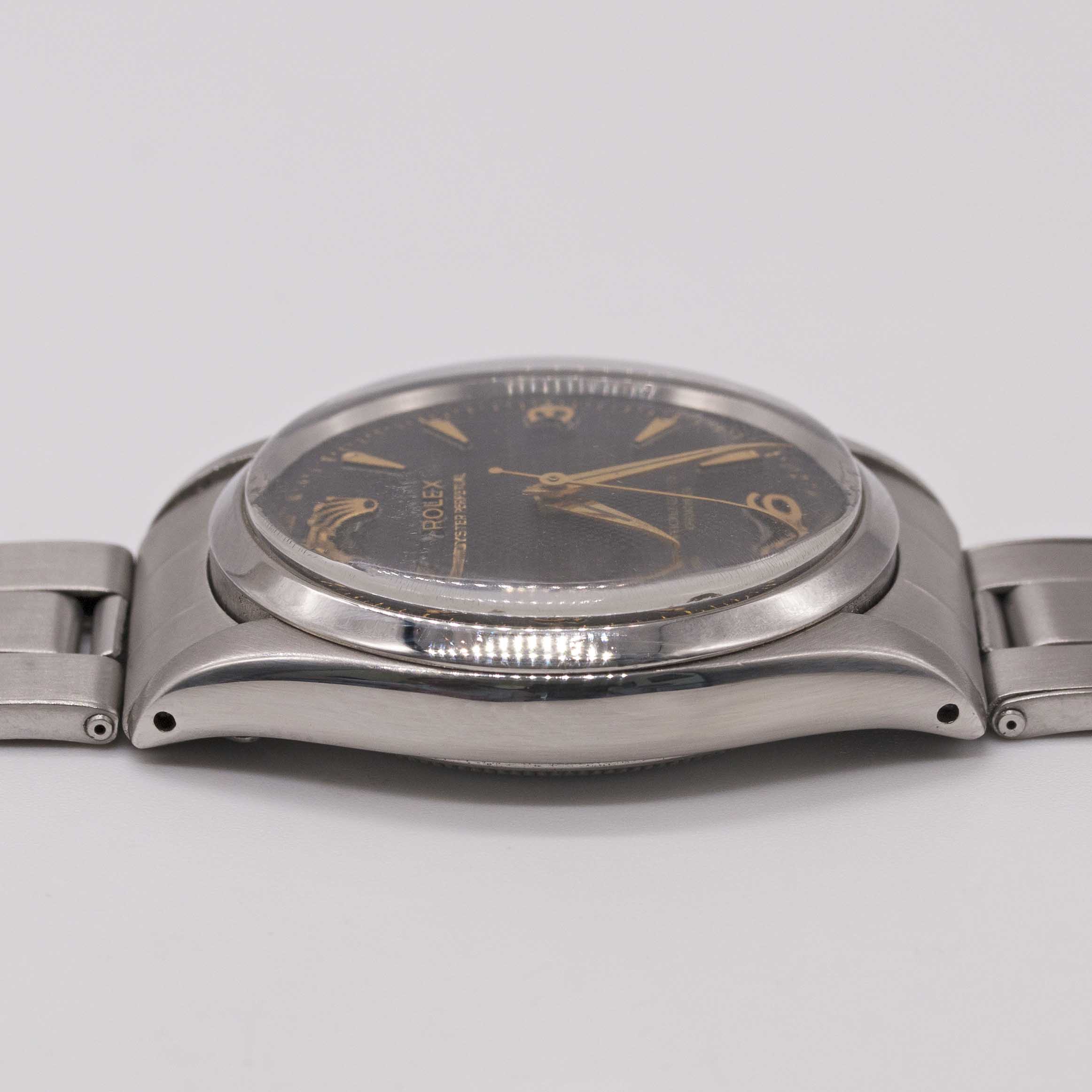 A RARE GENTLEMAN'S STAINLESS STEEL ROLEX OYSTER PERPETUAL BRACELET WATCH CIRCA 1956, REF. 6564 - Image 11 of 12