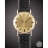 A GENTLEMAN'S 9CT SOLID GOLD ROLEX TUDOR SHOCK RESISTING WRIST WATCH CIRCA 1969, WITH CHAMPAGNE