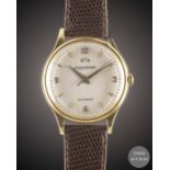 A GENTLEMAN'S LARGE SIZE 18K SOLID YELLOW GOLD JAEGER LECOULTRE "POWERMATIC" POWER RESERVE WRIST